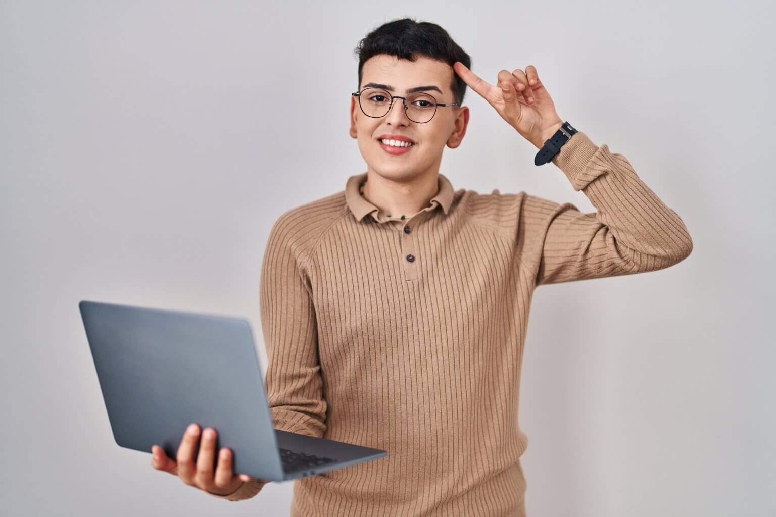 Which Video Games Will Make You Smarter Top 15 Picks Non Binary Person Using Computer Laptop Smiling Pointing Head With One Finger Great Idea Thought Good Memory 1536x1024 